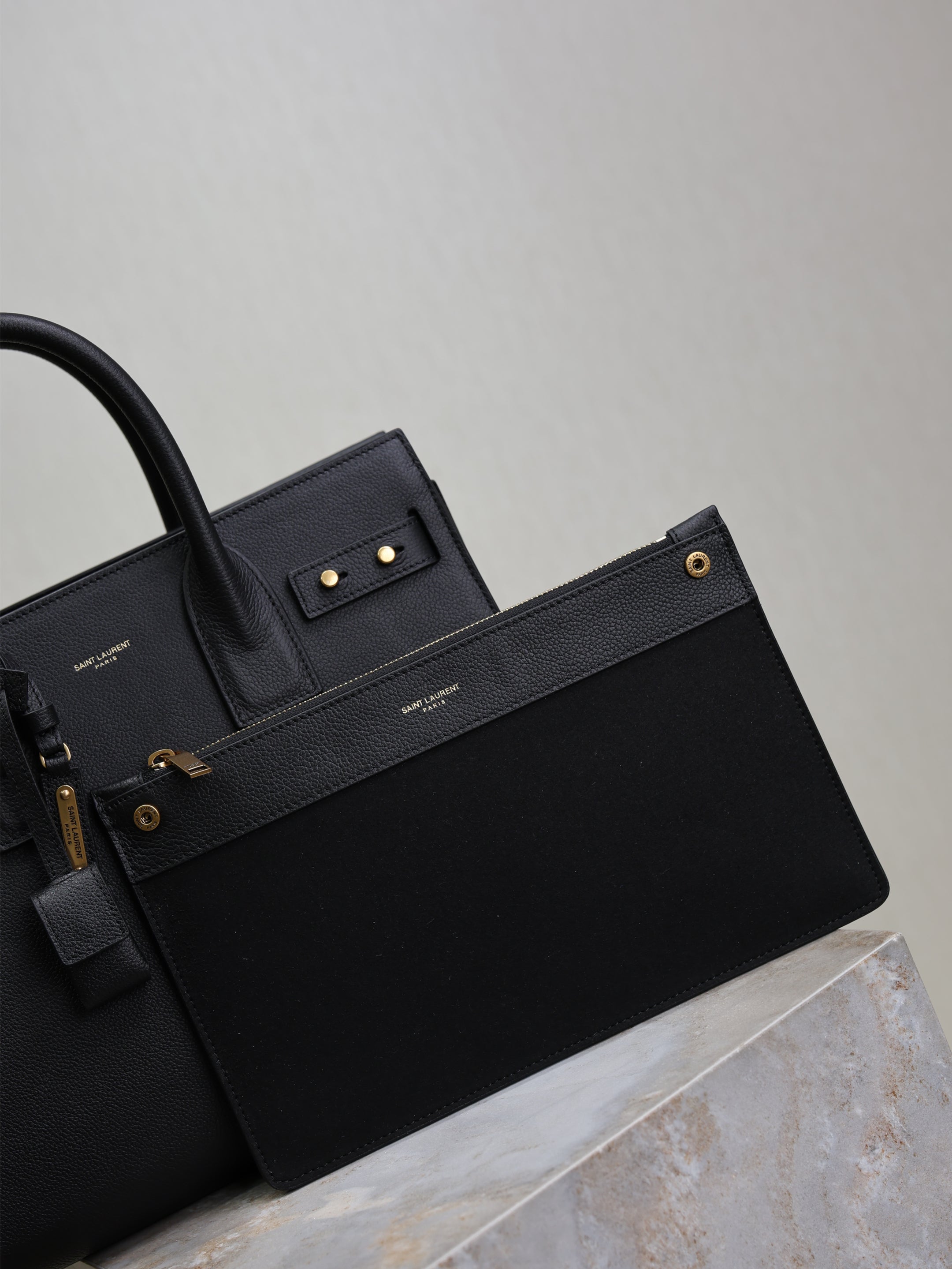 YSL 25S SAC DE JOUR GM 32 IN BLACK SUPPLE GRAINED CALFSKIN GOLD HARDWARE